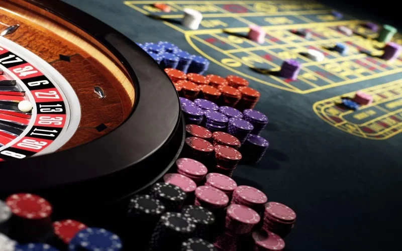 Confident woman holding glowing casino chips in front of a vibrant, illuminated background — modern CrownBD aesthetic crafted for Bangladeshi players